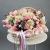Композиция в корзине "Диодора" из французских роз Квиксенд, диантусов и кустовых пионовидных роз Бомбастик в Черноголовке